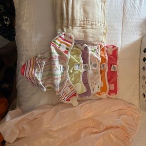 6 Thirsties diaper covers, 5 cloth inserts, laundry bags